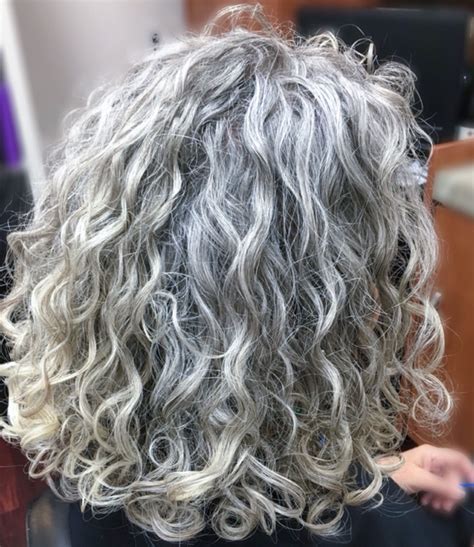 thick wavy curly natural grey hair i love the colour and texture of her hair going gray