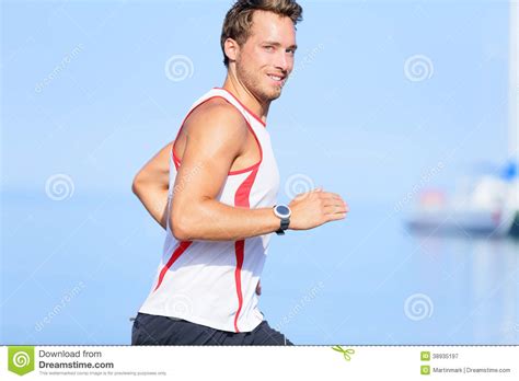 Running Man Runner Looking At Camera Smiling Stock Image Image 38935197