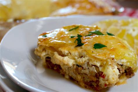 My dad's casserole, potatoes, ground beef, cream of mushroom soup, and a little water. Scalloped Meatloaf Casserole - What the Forks for Dinner?