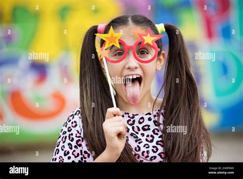 girl fun sticking out tongue party glasses girls funs poking tongues sticking out tongues