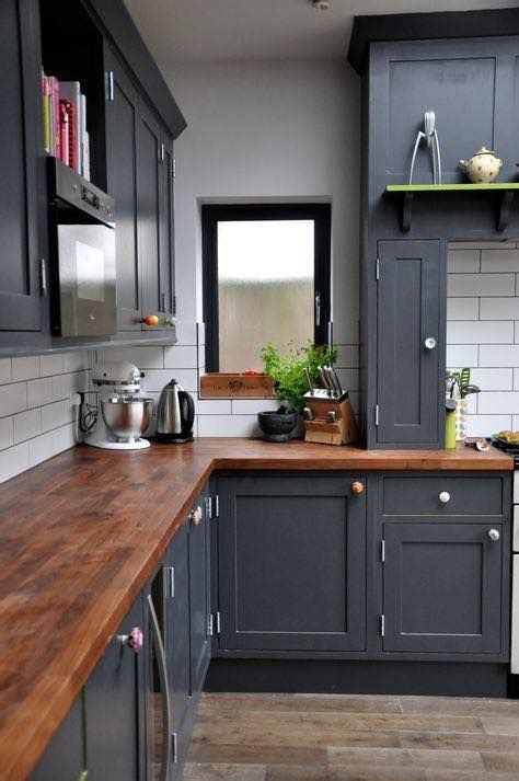 I just installed walnut butcher block countertop on my farmhouse island. Grey cabinets, butcher block countertop, white subway tile ...