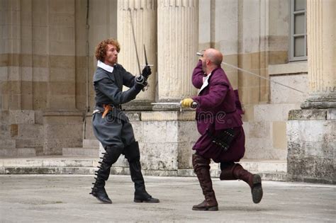 Musketeers Sword Fight Near Renaissance Castle In France Editorial