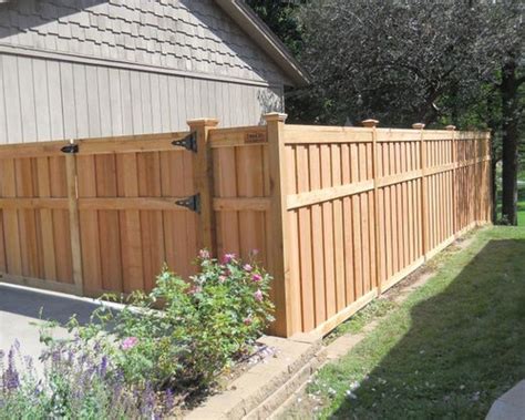 Spraying on the stain or paint offers better coverage and saves time versus applying it with a brush. Shadowbox Fence Design Ideas & Remodel Pictures | Houzz
