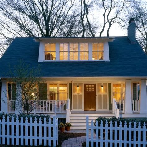 A House With White Picket Fence Around It
