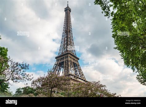 The Eiffel Tower And Cloudy Sky Stock Photo Alamy