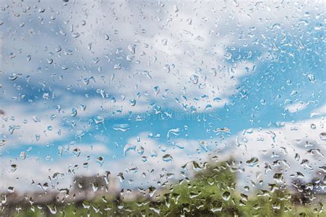Raindrops On The Window With A View Of Cloudy Sky Stock Photo Image