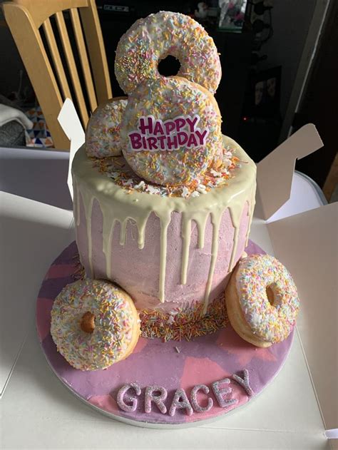 More golden and pink inspiration boards golden birthday theme inspiration board more baby… Doughnut cake | Girls birthday cakes easy, Girls birthday ...
