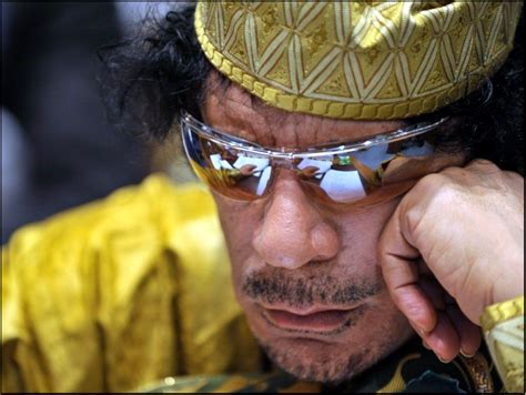 Gaddafi Captured Under Bridge