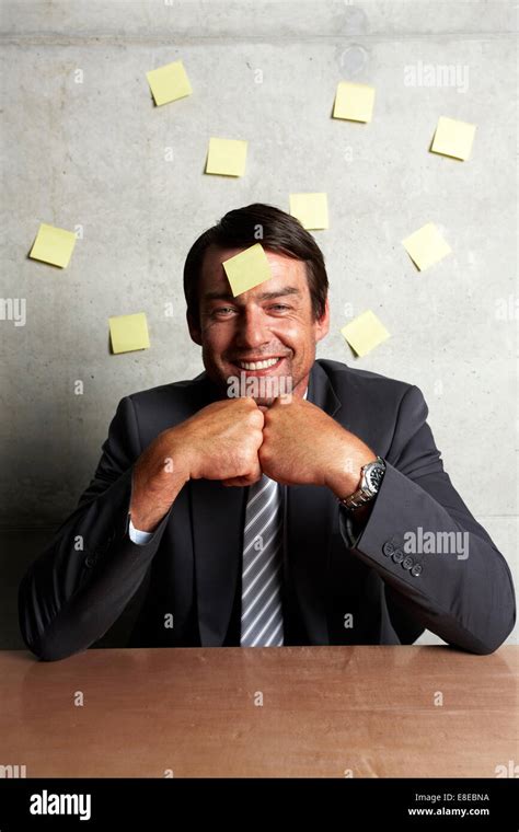 Man With Sticky Notes On His Head Stock Photo Alamy