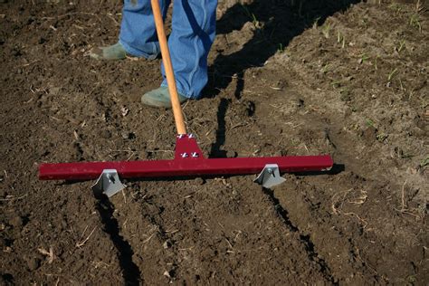 The row maker creates perfect planting furrows for vegetable transplants in your garden. Image 70 of Garden Row Maker | ucf-gvnk1