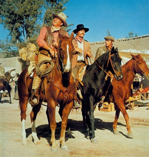 John Wayne Patrick Wayne And Chris Mitchum In Big Jake 1971