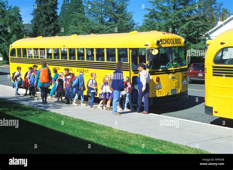 Elementary School Children Boarding School Bus After School Mt Shasta