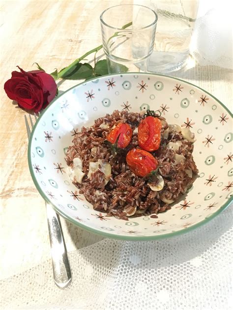 A questo punto uniamo ai funghi il riso; Riso Selvaggio con Funghi e Pomodorini al Forno e il ...