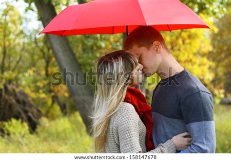 Young Couple Man Woman Kiss Under Foto Stock 158147678 Shutterstock