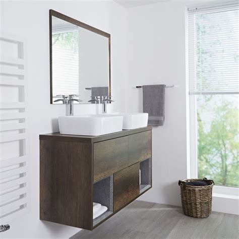 The light wood ensures this vanity unit doesn't make your small bathroom feel even more cluttered, and instead, it just adds a handy unit to the room that you'll make use of every day. Milano Bexley - Dark Oak 1200mm Wall Hung Open Shelf ...