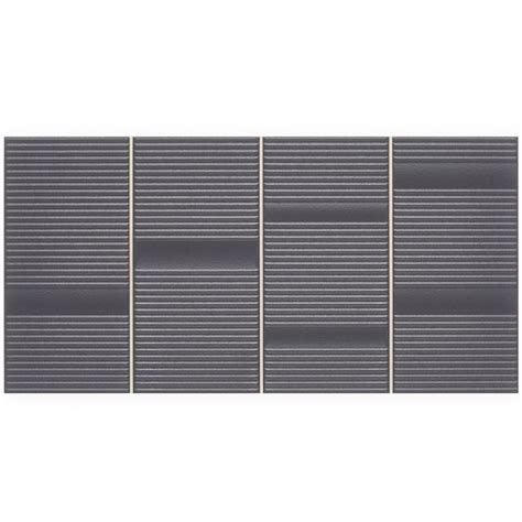 A Set Of Four Gray Tiles With Horizontal Lines On Each One Side And