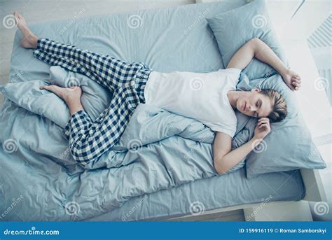 Top Above High Photo Of Dreamy Calm Man Lying On Bed Sleeping On Linen