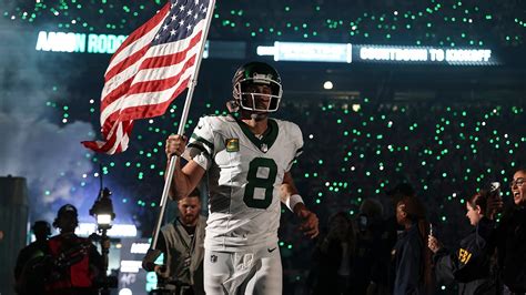 Jets Owner Shares Video Of Aaron Rodgers Carrying American Flag With
