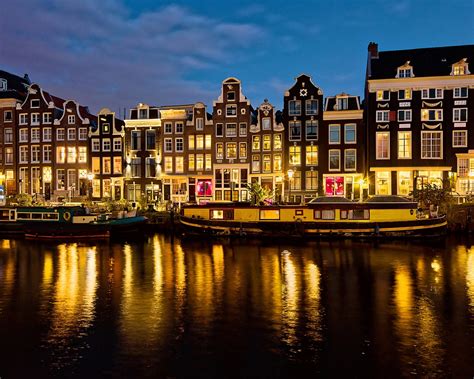 Países Bajos, Amsterdam, casas, río, luces, noche Fondos de pantalla