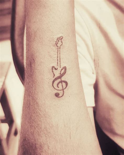 101 Awesome Guitar Tattoo Ideas You Need To See Guitar Tattoo Design