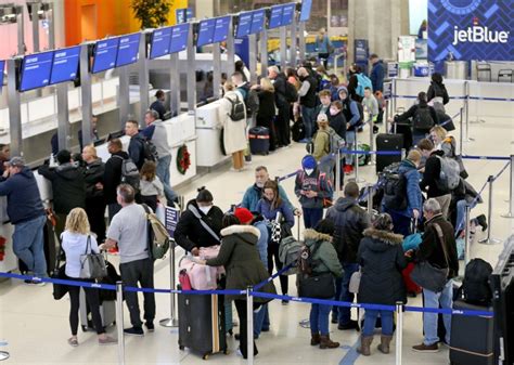 boston logan flight delays cancellations continue piling up after massive winter storm