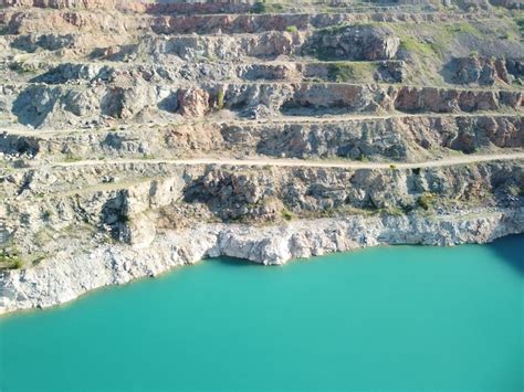 Premium Photo Aerial Top View On Opencast Mining Quarry With Flooded