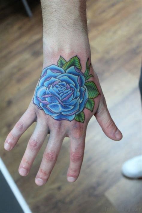 Amazing grey ink rose flower hand tattoo. 30 Fantastic Blue Rose Tattoos On Hand