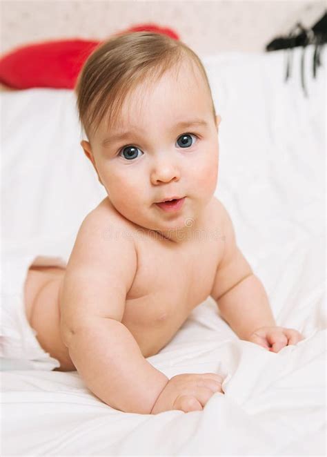 Happy Baby In Diaper Lies On The Bed Stock Image Image Of Male