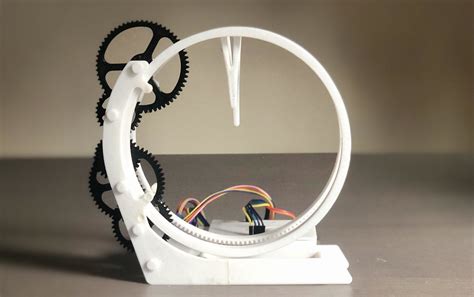 Holo Clock Is A Novel 3d Printed Clock That Tells Time Using A Pair Of