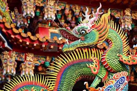 Traditional Chinese Dragon Decoration On Roof Of Temple By Leungchopan