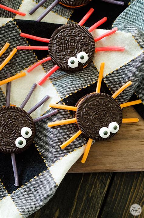 Bat oreo cookie balls are the perfect halloween food idea for your next party! oreo licorice spider cookies