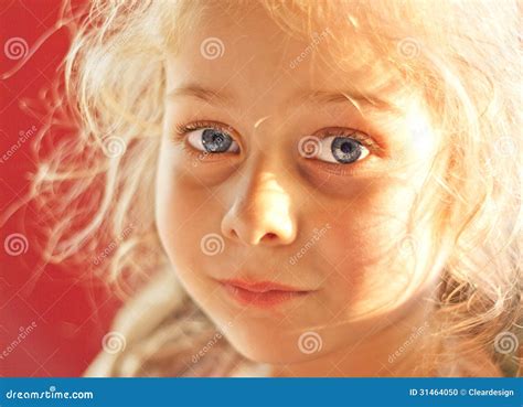 Close Up Portrait Of Five Years Old Blond Child Girl Stock Photo