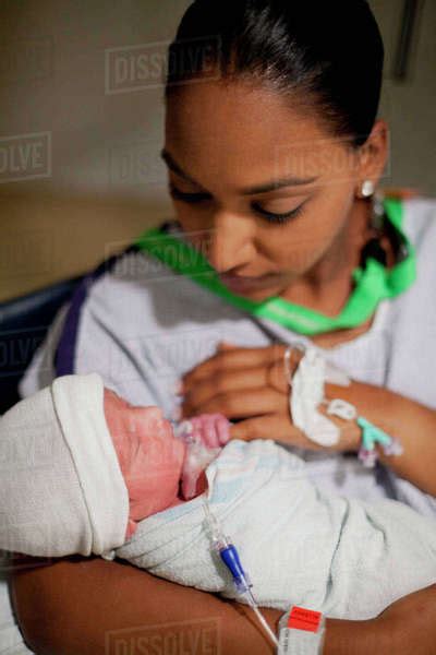Mother Holding Newborn Baby In Hospital Stock Photo Dissolve