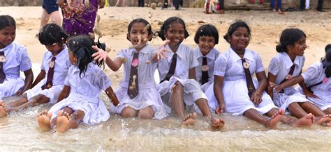 Sri Lankan Schoolgirls Having Fun At The Beach License Download Or