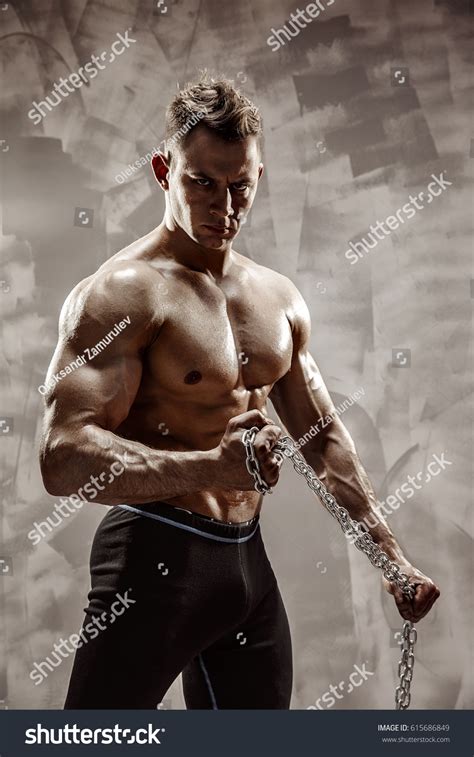 Perfect Male Body Awesome Bodybuilder Posing Stock Photo 615686849