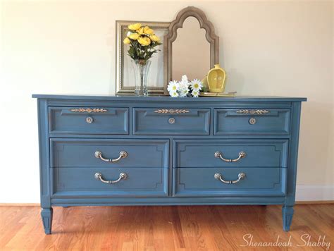 Luxury furniture & accessories with a focus on detail and distinction, we offer an eclectic collection of luxury furniture, homewares, lighting, textiles, rugs and artwork. Blue and gold painted dresser. Painted in Annie Sloan Aubusson Blue. Sealed with clear and dark ...