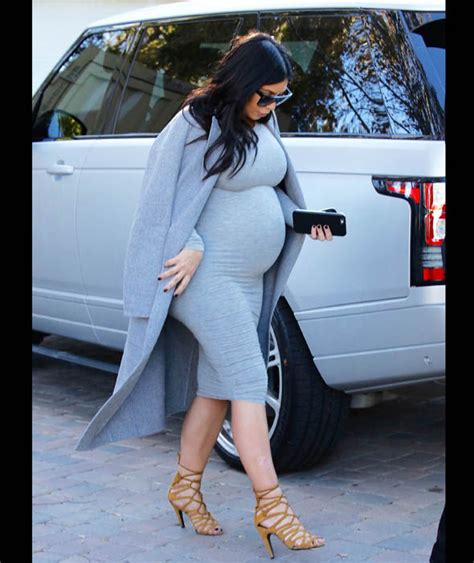 Heavily Pregnant Kim Kardashian Wears All Grey As She Films For Keeping