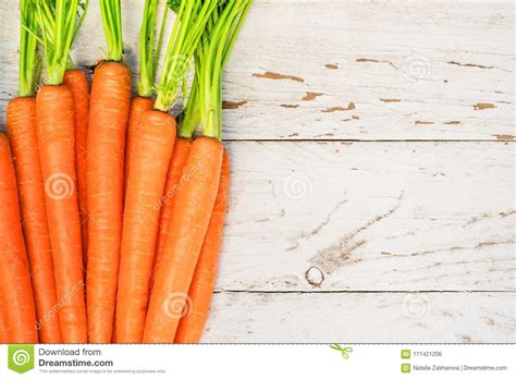 Fresh Carrots Heap With Green Stems Raw Carrots On Rustic White Stock