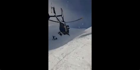 Pilot Rescues Group Of Skiers Without Landing The Helicopter