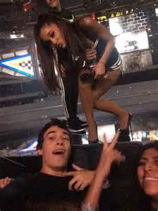 Ariana Grande Takes Selfie With Fan During Halftime Show Photo