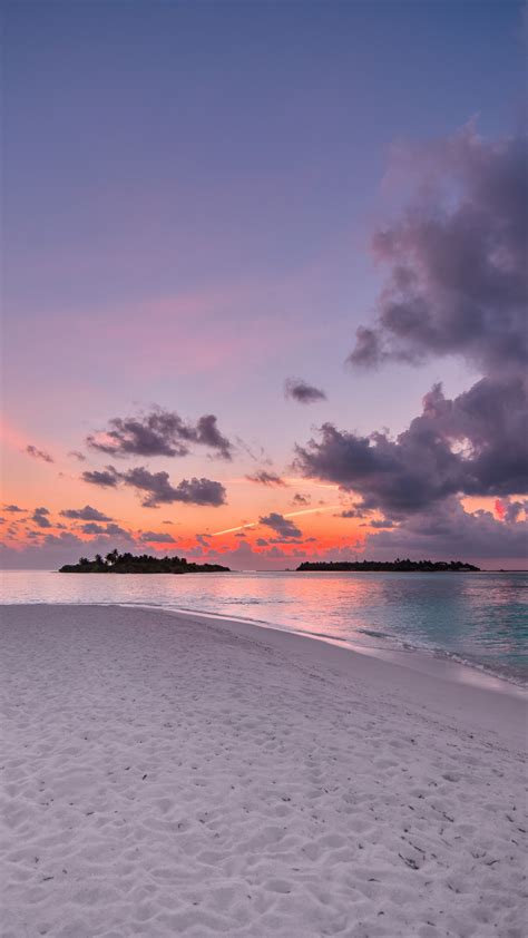 Download 2160x3840 Wallpaper Beach Island Sunset Clouds Nature 4к