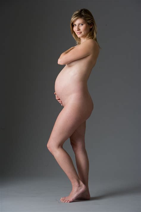 Classy Nude Maternity Portrait Of Pregnant Woman In Studio Pierre