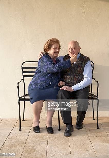 Woman Pinching Mans Cheek Photos And Premium High Res Pictures Getty