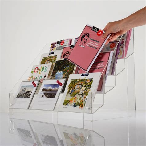 Manufacturer & designer of pocket & counter greeting card racks. Greeting Card Stand - Postcard display rack - Counter Card Displays