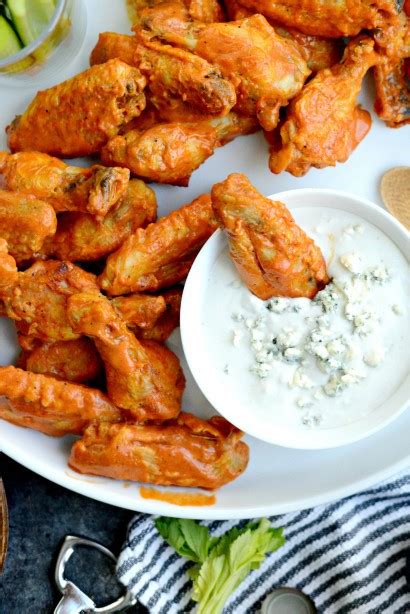 I served extra buffalo sauce along with regular bleu cheese salad dressing for those who wanted more heat. Spicy Garlic Chicken Wings and Blue Cheese Dip | Tasty ...