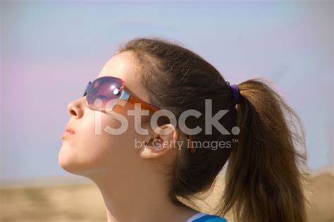 Young Girl Facing The Sun Stock Photo Royalty Free Freeimages