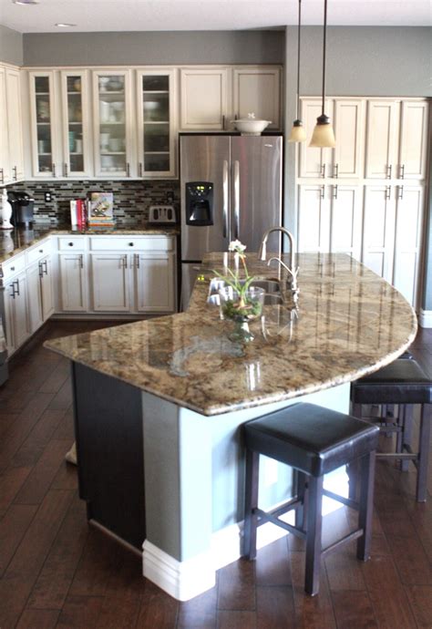 Freestanding kitchen island with 3 drawers, bookcase & double storage cupboard. 21 Splendid Kitchen Island Ideas