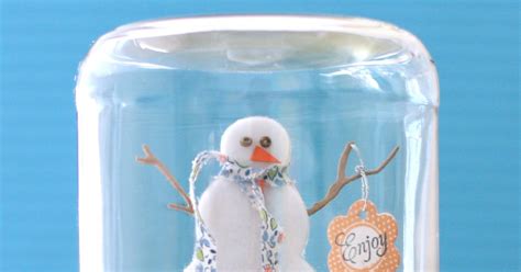 Notable Nest Snowman Snow Globe