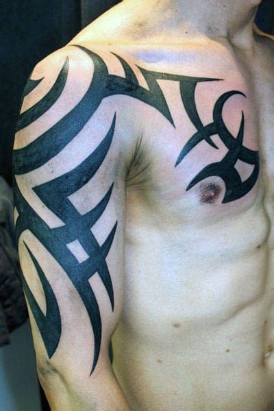 Even with the hair shaved complements the chest. 75 Tribal Arm Tattoos For Men - Interwoven Line Design Ideas