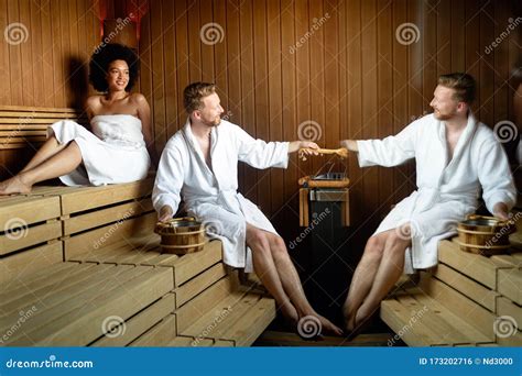 Beautiful Couple Relaxing In Sauna And Caring About Health And Skin